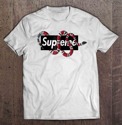 supreme shirt with gucci snake raped arownd it
